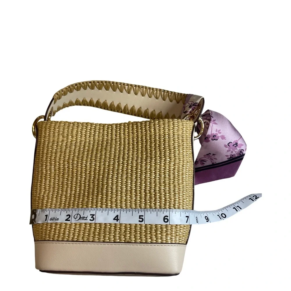 Elegant Straw Crossbody Tote with Floral Scarf Accent and matching coin purse.